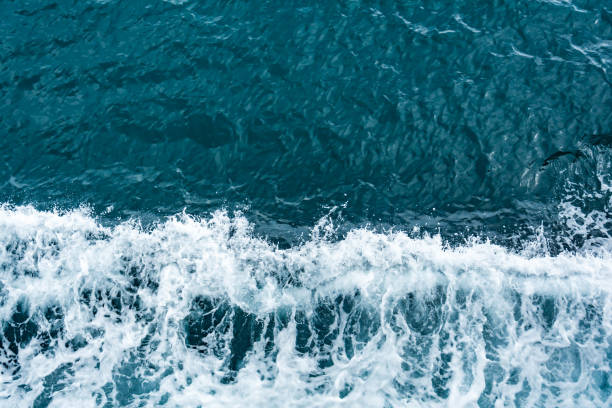 istock Blue sea and a moving reflection of sunlight 639990010