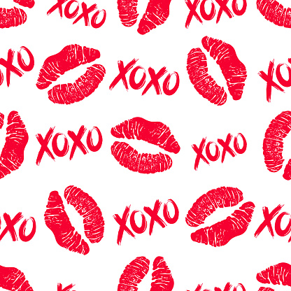 Lipstick kisses and XOXO hugs and kisses brush lettering seamless pattern. Illustration for Valentines Day greeting card and decoration. Vector.