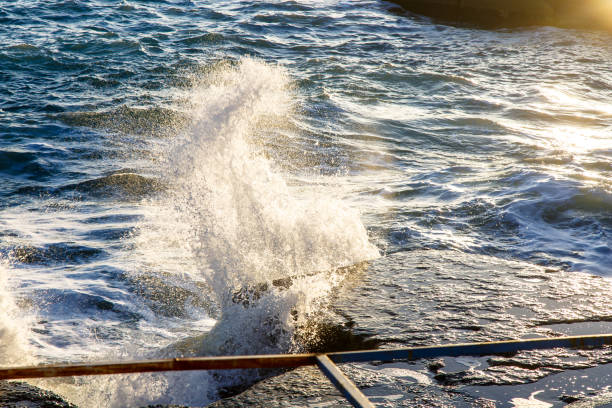 istock The sea water splashes in the rays 639990722