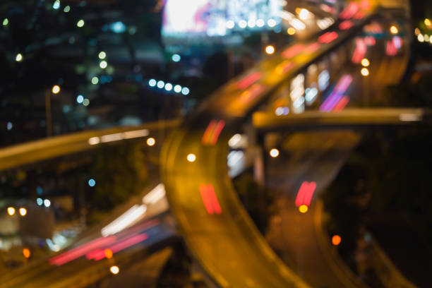 istock Aerial view close up blurred light highway interchanged 639991028