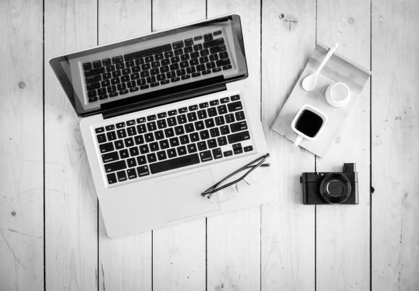 istock Wooden desk with various gadgets and accessories 639992390