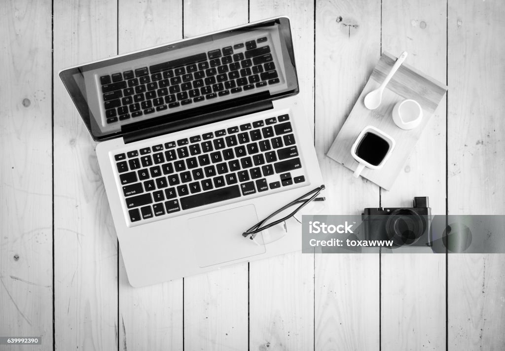 Wooden desk with various gadgets and accessories Wooden desk with various gadgets and accessories, top view Backgrounds Stock Photo