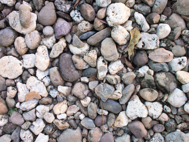 istock Sea stones background, small rocks. 639992444
