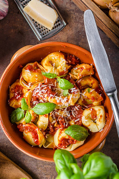 istock Homemade tortellini with tomato sauce 639994298