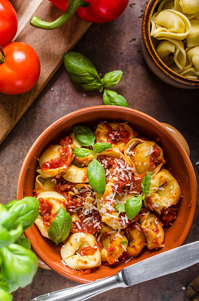 istock Homemade tortellini with tomato sauce 639994458