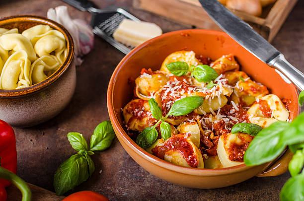 istock Homemade tortellini with tomato sauce 639994532