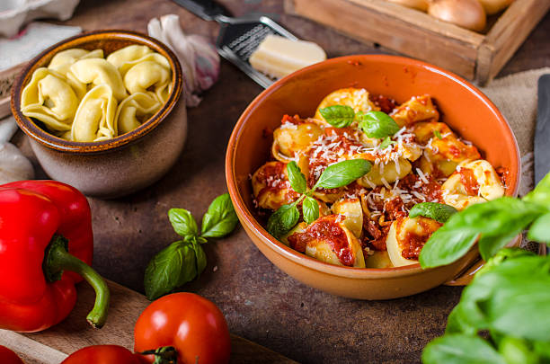 istock Homemade tortellini with tomato sauce 639994606