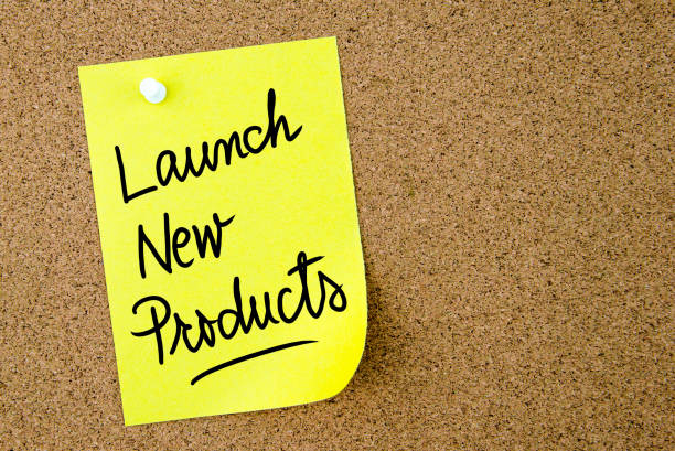 istock Launch New Products text written on yellow paper note 639995642