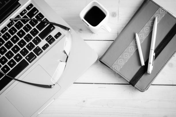 istock Wooden desk with various gadgets and accessories 639996822