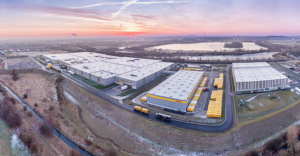 Amazon distribution center, aerial Rheinberg, Germany - January 27, 2017: The Amazon distribution centre with it's companys Amazon; DHL and HAVI is growing fast rheinberg illumination stock pictures, royalty-free photos & images