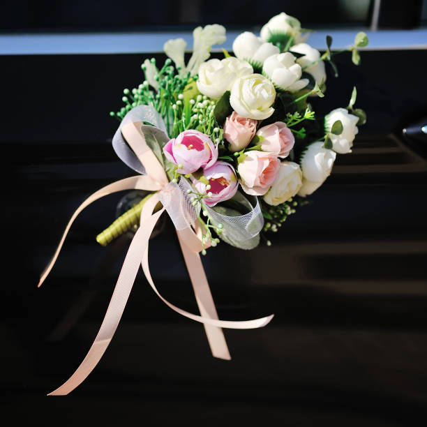 istock flowers arrangement on bridal car 640002936