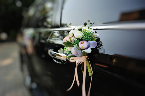 istock flowers arrangement on bridal car 640002988