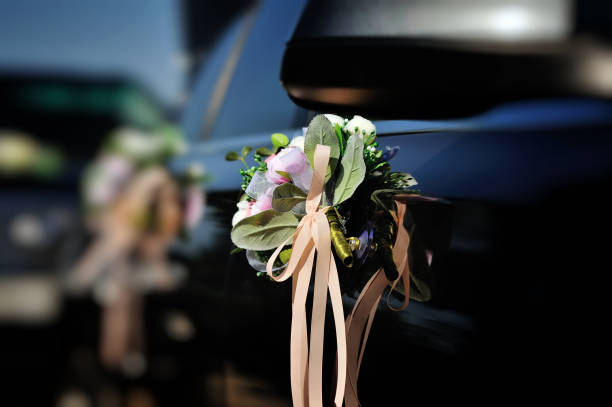 istock flowers arrangement on bridal car 640003172