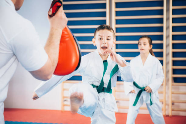 istock Group of children, Tae kwon do training 640007840