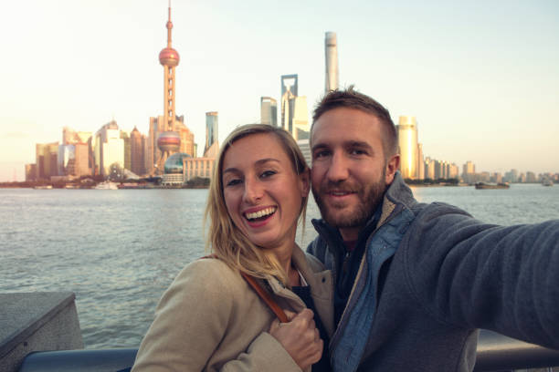 Young couple taking selfie in Shanghai