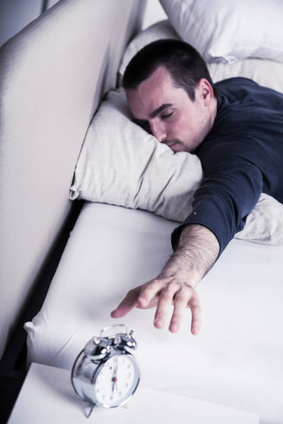 istock Turning off the alarm clock in the morning 640010828