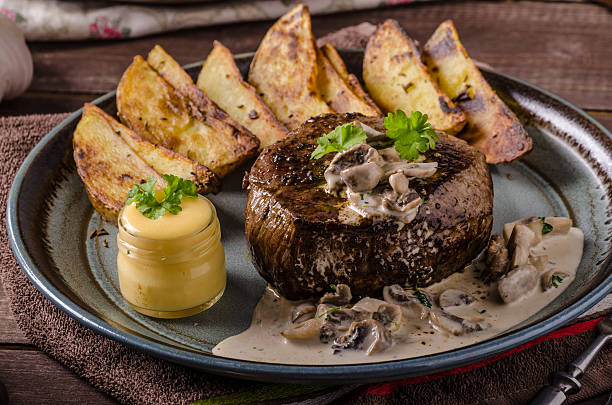 istock Steak with pepper sauce and mushrooms 640014478