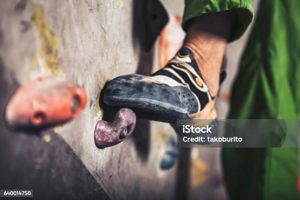 Male Foot On Climbing Wall Stock Photo - Download Image Now - Bouldering, Indoors, Clambering