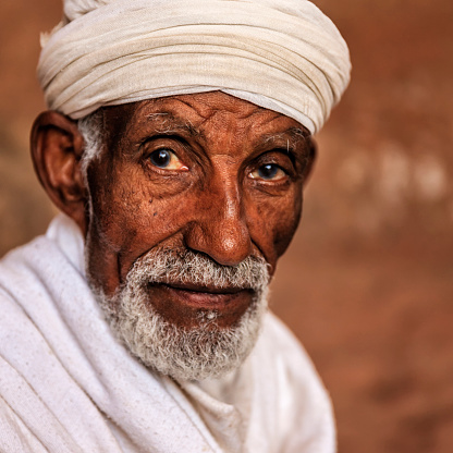 Priest of rock-hewn church,Lalibela, northern Ethiopia, Africa. Lalibela is famous for its rock-cut churches and is one of Ethiopia's holiest cities.http://bhphoto.pl/IS/ethiopia_380.jpg