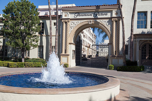 Paramount Pictures Los Angeles, United States - September 18, 2016: The famous adorned entrance arch with a fountain of Paramount Pictures, Hollywood, Los Angeles, California. paramount studios stock pictures, royalty-free photos & images