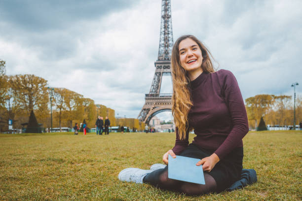 istock Happy young woman enjoying Paris 640024816