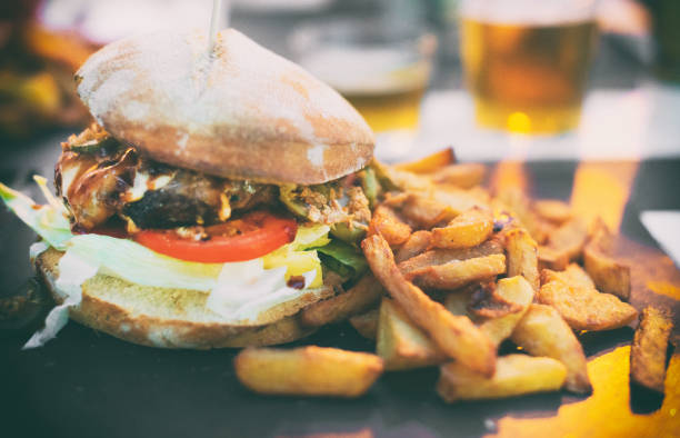 istock Junk food concept. Hamburger with fries. 640025552