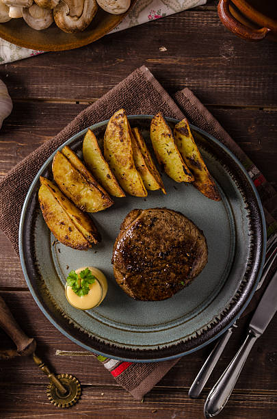 istock Steak with pepper sauce and mushrooms 640025934