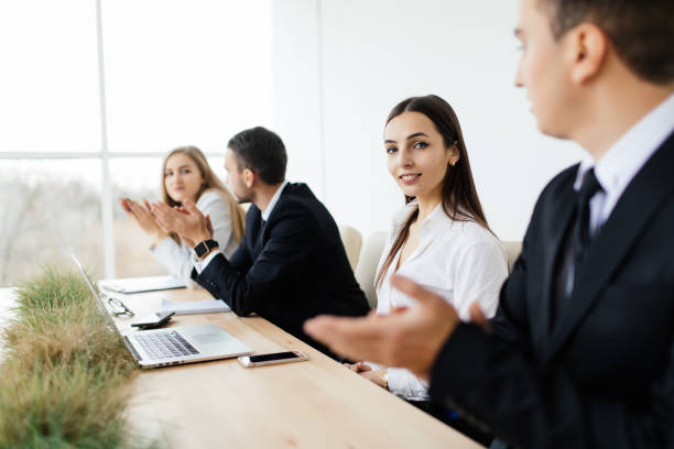 istock Corporate work. Business people discussing in meeting room 640026868