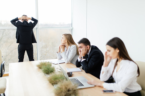 Unhappy And Sad Business People In Meeting Room Stock Photo - Download ...