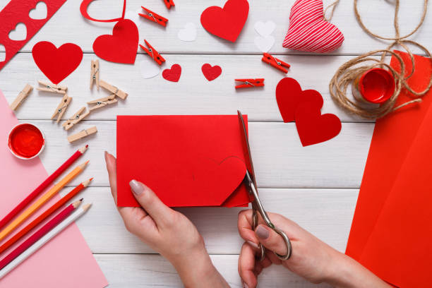 istock Valentine day handmade scrapbook background, cut and paste hearts card 640027140