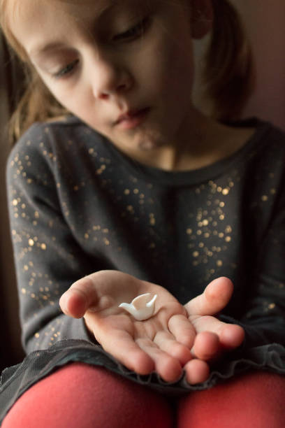 istock Child and dove wishing for peace 640027446
