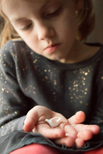 istock Child and dove wishing for peace 640028262