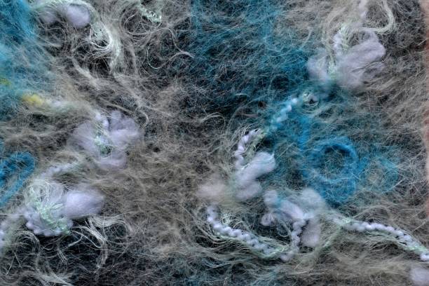 istock bright blue wool fibers bound with gray cloth 640028862