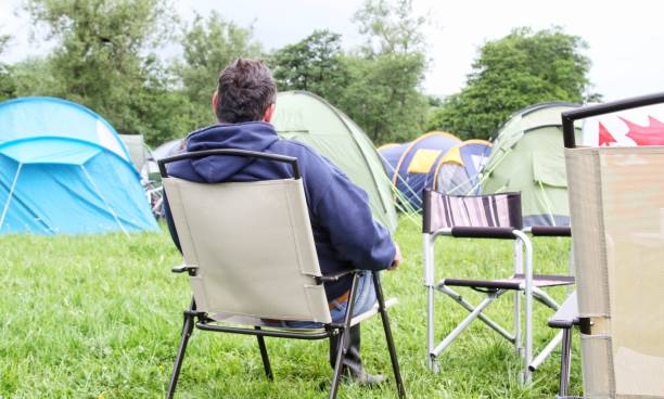 istock back view of mature man at campsite 640029502