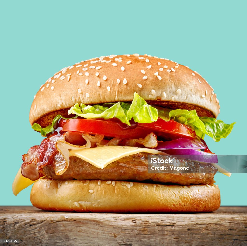 fresh tasty burger fresh tasty burger on wooden table Burger Stock Photo