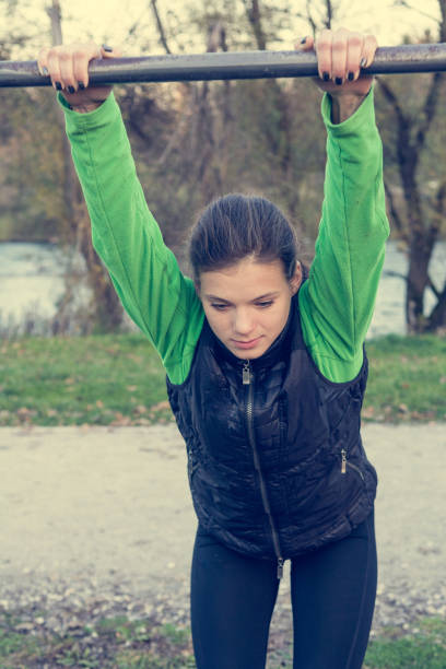 istock Female athlete stretching in park. 640032928