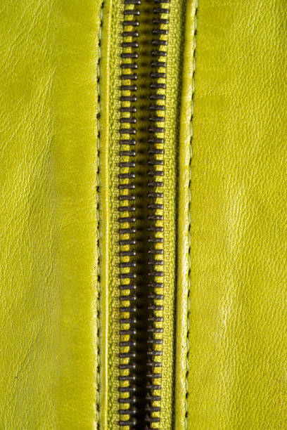 istock Green leather jacket zippers. Leather jacket macro details. 640038644