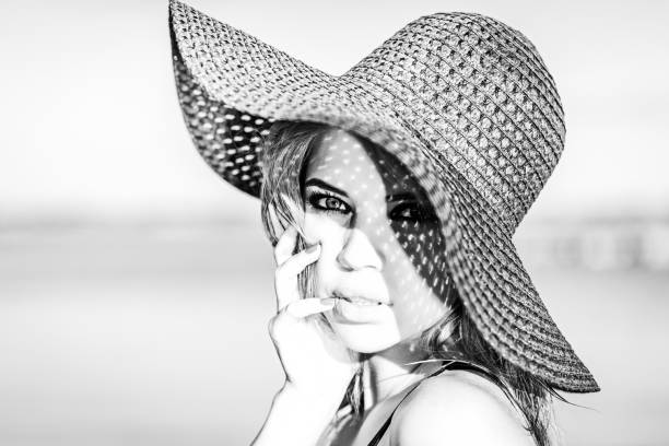 istock Nice girl in a hat. Black and white photo. 640038744