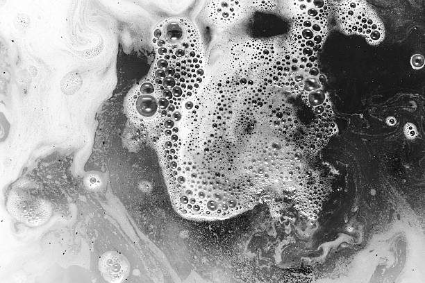 istock abstract background of blue colored foam and bubbles on water 640040008