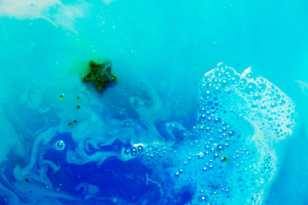 istock abstract background of blue colored foam and bubbles on water 640040352