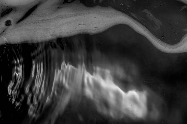istock abstract background of blue colored foam and bubbles on water 640041702
