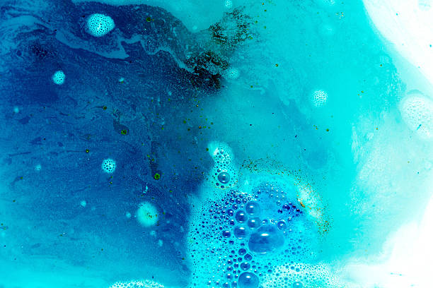 istock abstract background of blue colored foam and bubbles on water 640041858