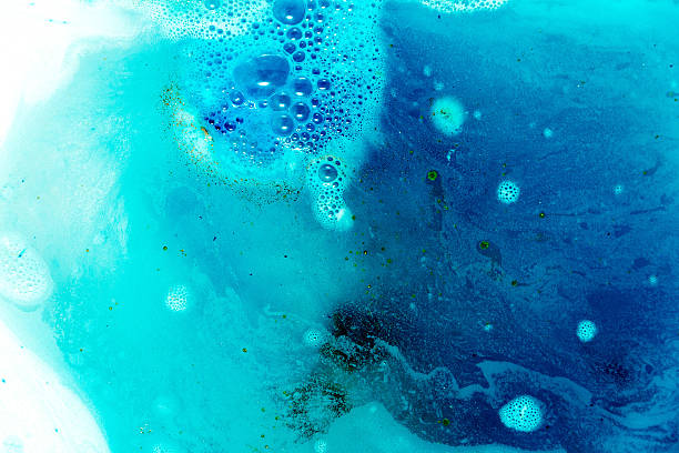 istock abstract background of blue colored foam and bubbles on water 640041870