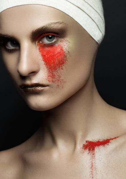 istock Beauty girl bandage plastic surgery red make up 640041882