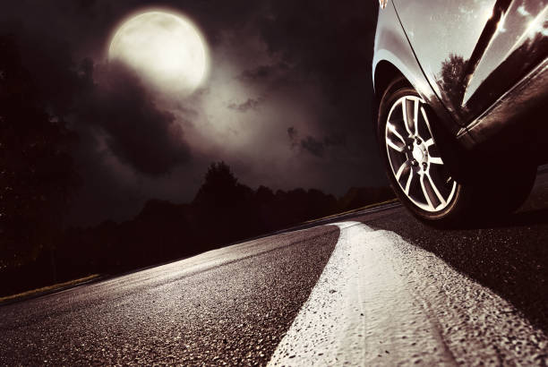 istock The car moves on fast speed at night. 640042430