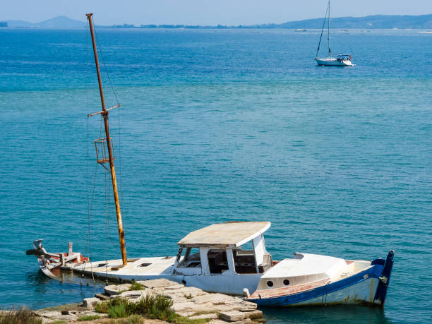 istock Sunk ruined boat at Lefkada island 640043472
