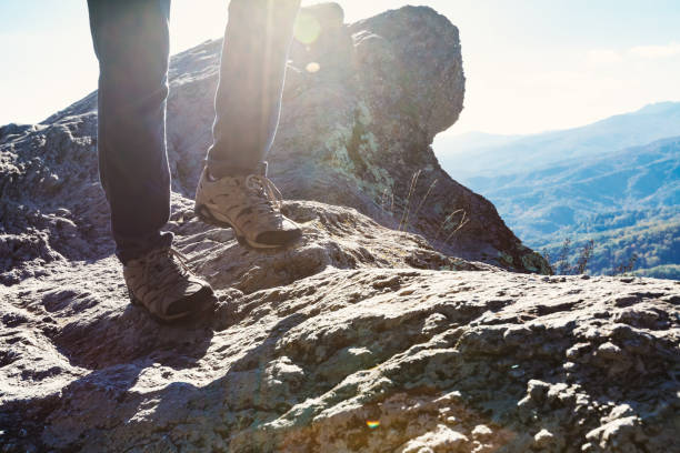 istock Man at the edge of a cliff 640047280