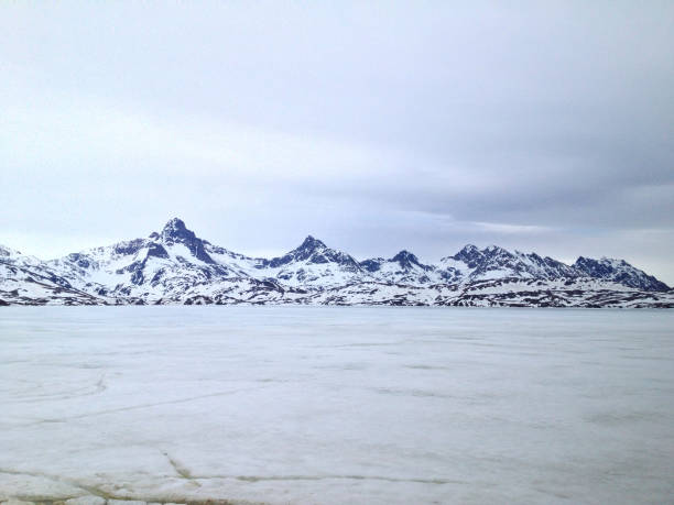 istock Frozen Lake and Mountains in Greenland 640052674