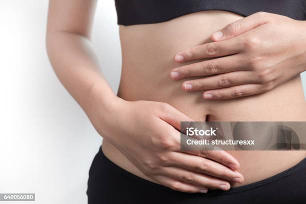 Pregnancy Or Diet Concept Stock Photo - Download Image Now - Massaging, Abdomen, Constipation