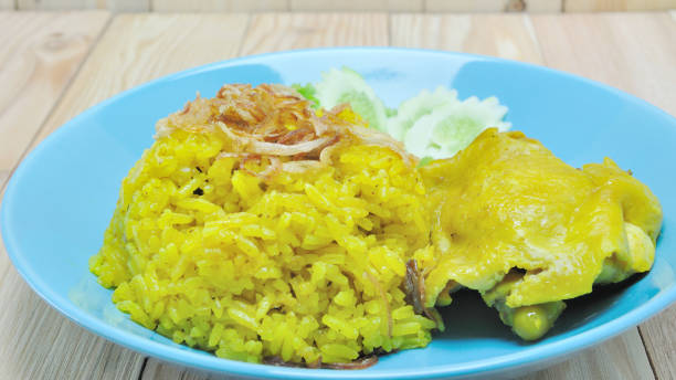 istock Chicken biryani rice, traditional food spicery fried crispy onio 640056450